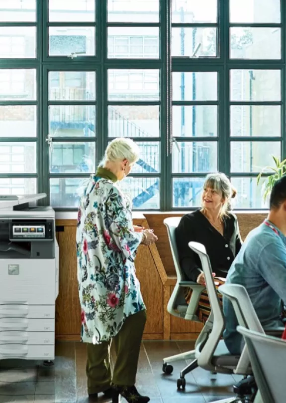 People working and collaborating in a modern office